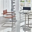 Pemberly Row Faux Leather Stainless Steel Chair with Two-piece Set in Amber