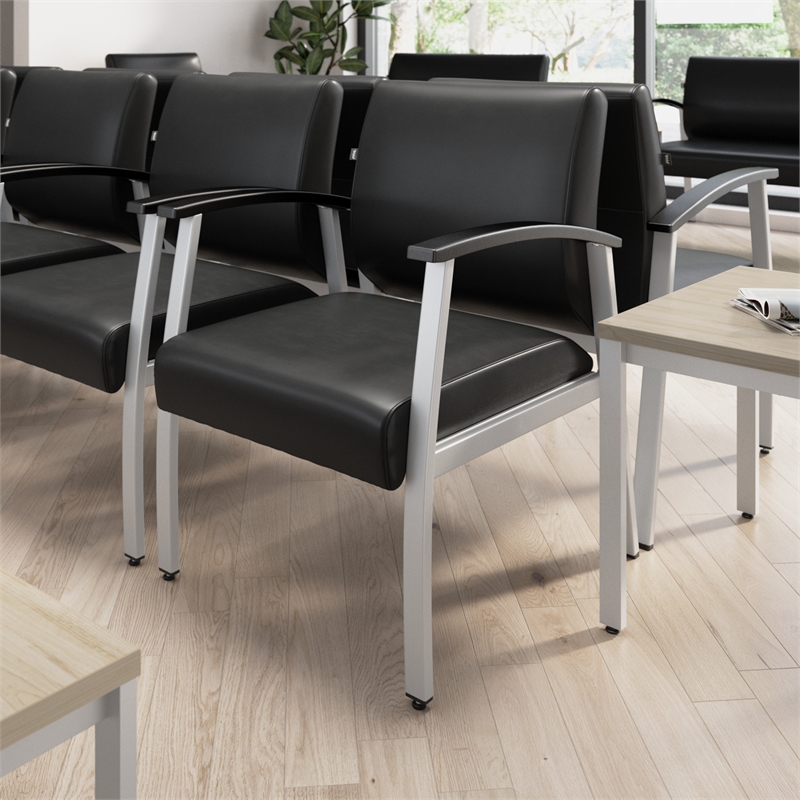 Pemberly Row Waiting Room Guest Chair with Arms in Black Vinyl