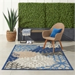 Pemberly Row 6' x 9' Fabric Indoor/Outdoor Rug in Blue/Multi-Color