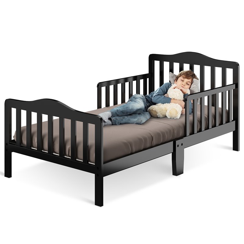 Pemberly Row Solid Rubber and Poplar Wood Toddler Bed with Guardrails in Black