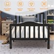 Pemberly Row Solid Rubber and Poplar Wood Toddler Bed with Guardrails in Black