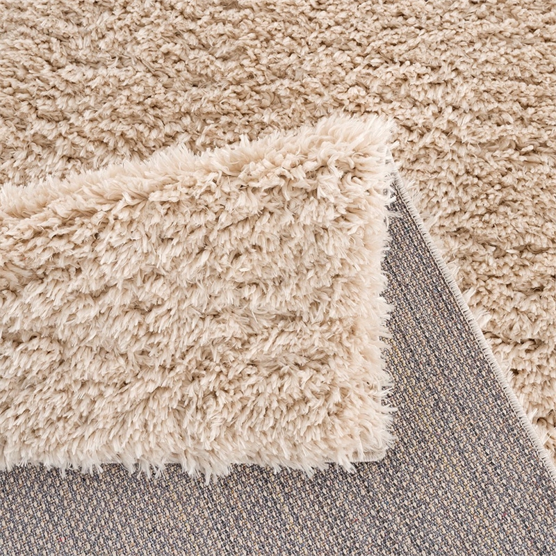 Pemberly Row Super Soft Polyester Shag Area Rug in Cream 5x7'