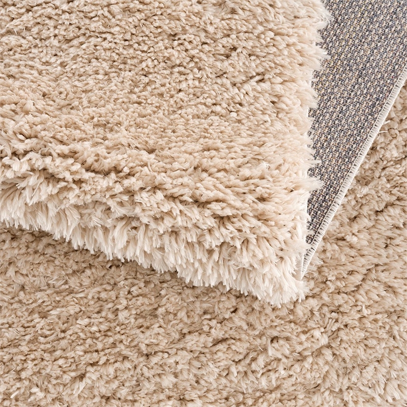 Pemberly Row Super Soft Polyester Shag Area Rug in Cream 5x7'