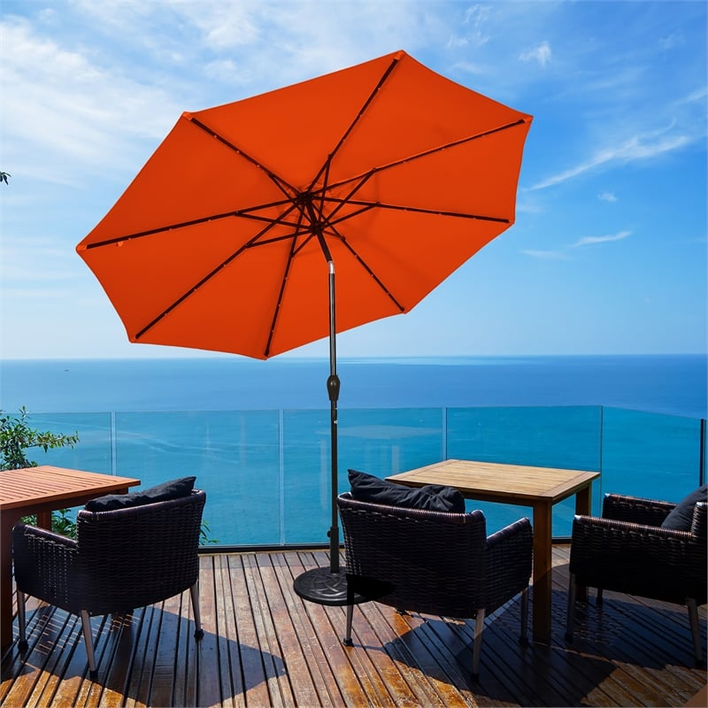Pemberly Row 10ft Patio Solar Umbrella LED Patio Market Steel Tilt in Orange