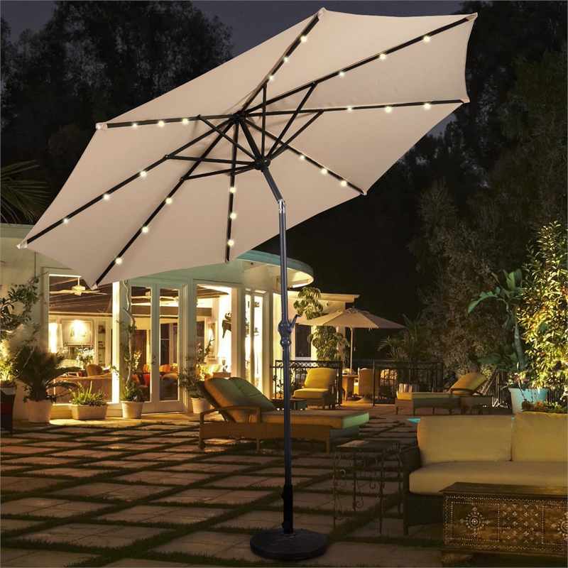 Pemberly Row 10ft Patio Solar Umbrella LED Patio Market Steel Tilt in Beige