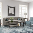 Pemberly Row Rectangle Coffee Table in Black and Bronze with Mirrored Shelf