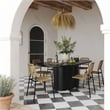 Pemberly Row Oval Faux Plaster & Stone Dining Table in Black