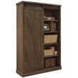 Pemberly Row 8-Shelf Wood Bookcase with Sliding Door in Brown