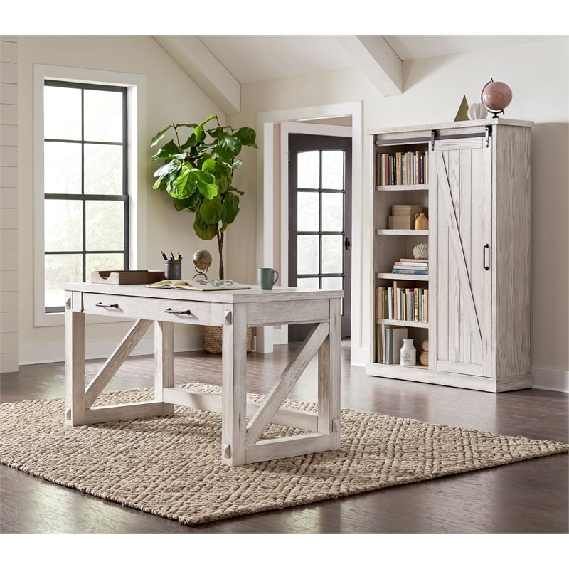 Pemberly Row 8-Shelf Wood Bookcase with Sliding Door in White