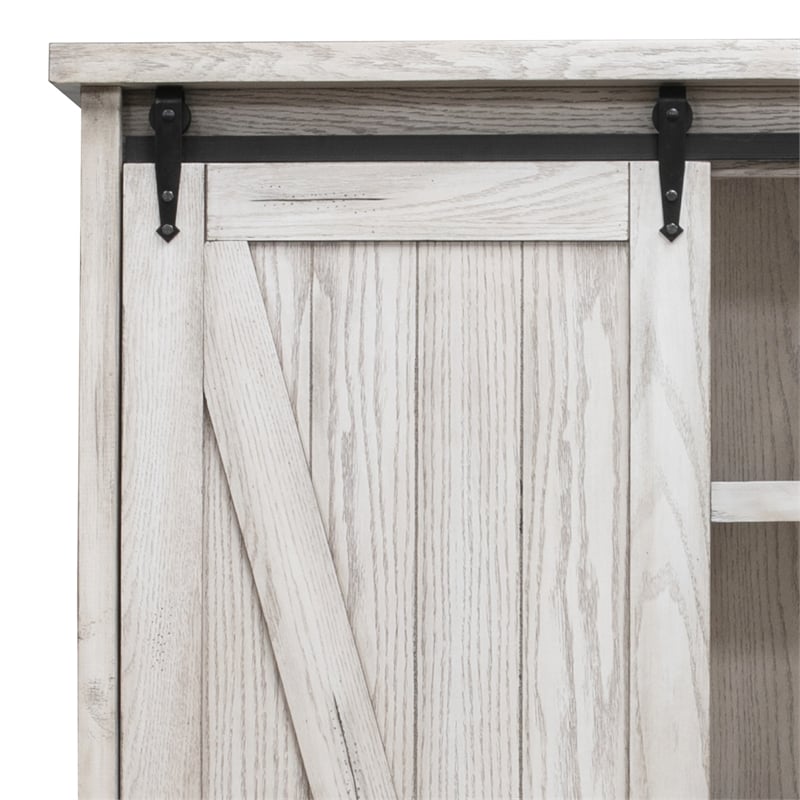 Pemberly Row 8-Shelf Wood Bookcase with Sliding Door in White