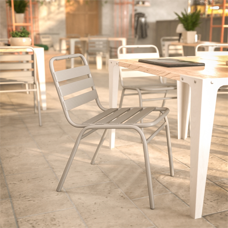 Pemberly Row Triple Slat Back Aluminum Restaurant Stack Chair in Silver