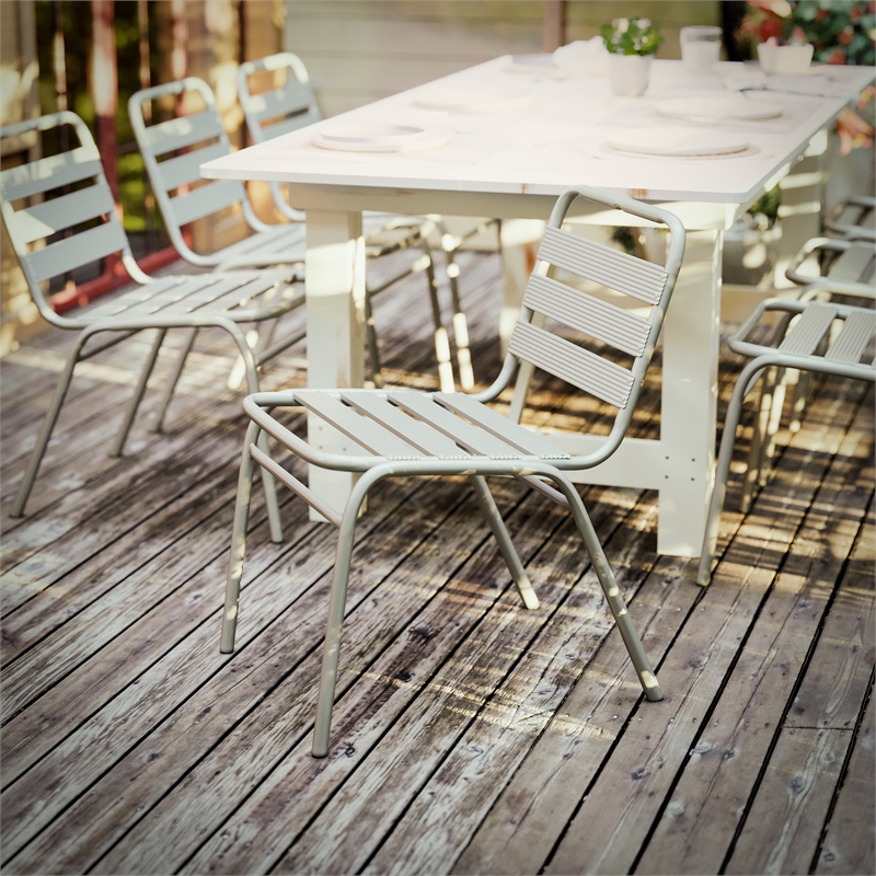 Pemberly Row Triple Slat Back Aluminum Restaurant Stack Chair in Silver