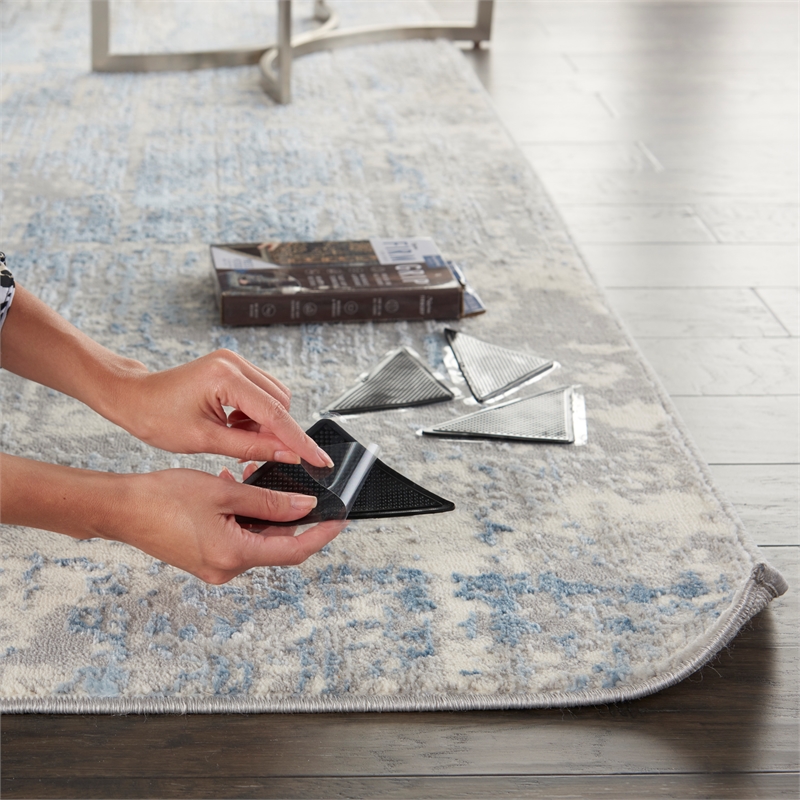 Pemberly Row Transitional Rug Gripper 8-Piece in Black for Indoor Rug