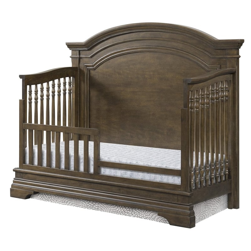 Pemberly Row Traditional Wood Arch Convertible Crib in Rosewood Brown
