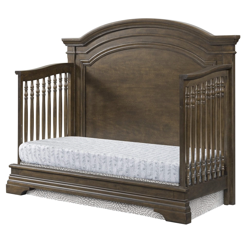 Pemberly Row Traditional Wood Arch Convertible Crib in Rosewood Brown