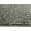 Pemberly Row Geometric 5'5 x 7'7 Polypropylene Area Rug in Sage Green