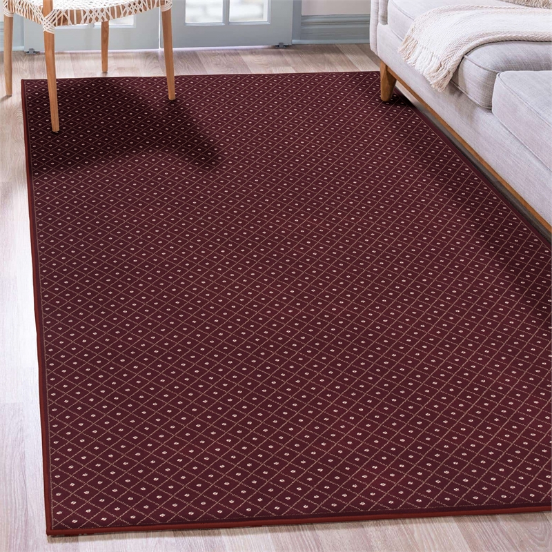 Pemberly Row Geometric 5'5 x 7'7 Polypropylene Area Rug in Burgundy Red