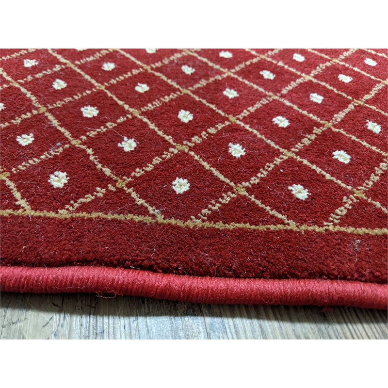 Pemberly Row Geometric 5'5 x 7'7 Polypropylene Area Rug in Burgundy Red