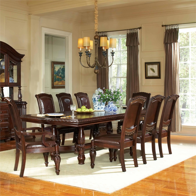 Pemberly Row Faux Leather Seating Contemporary 9 piece Dinng Set in Brown
