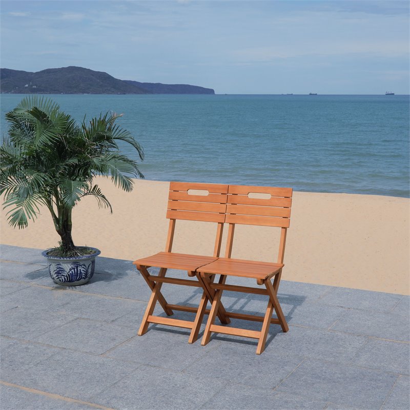 Pemberly Row Eucalyptus Wood Outdoor Folding Chair in Natural (Set of 2)