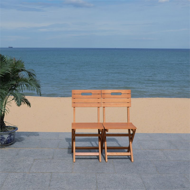 Pemberly Row Eucalyptus Wood Outdoor Folding Chair in Natural (Set of 2)