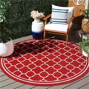 Pemberly Row Polypropylene Red Indoor Outdoor Rug - Round 7'10&quot