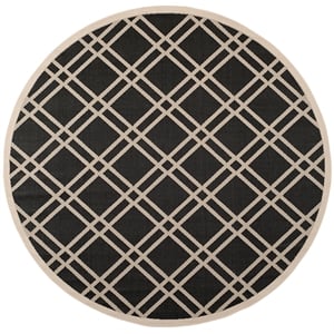 Pemberly Row Polypropylene Black Indoor Outdoor Rug - Round 7'10&quot