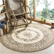 Pemberly Row Polypropylene Creme Indoor Outdoor Rug - Round 5'3
