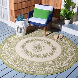 Pemberly Row Polypropylene Cream Indoor Outdoor Rug - Round 6'7&quot