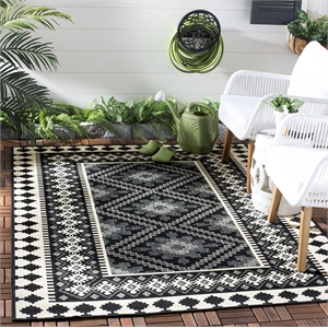 Pemberly Row Polypropylene Black Indoor Outdoor Rug - 8' x 11'2&quot