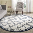 Pemberly Row Polypropylene Ivory Indoor Outdoor Rug - Round 7'