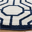 Pemberly Row Polypropylene Ivory Indoor Outdoor Rug - Round 7'