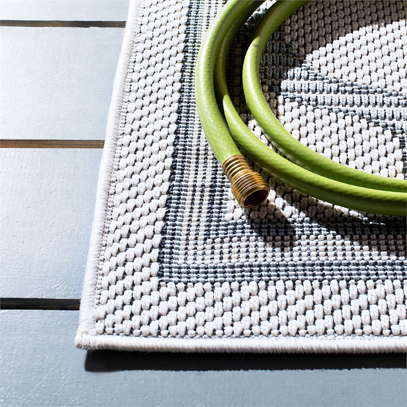 Pemberly Row Polypropylene 8' x 10' Rug in Ivory and Light Blue