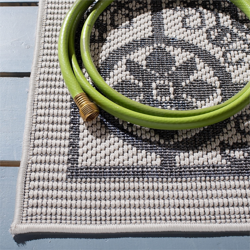 Pemberly Row Polypropylene 9' x 12' Rug in Ivory and Charcoal