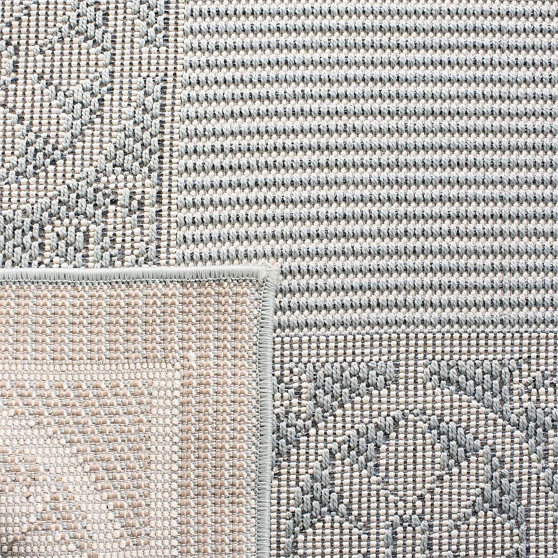 Pemberly Row Polypropylene 4' x 6' Rug in Light Blue and Ivory