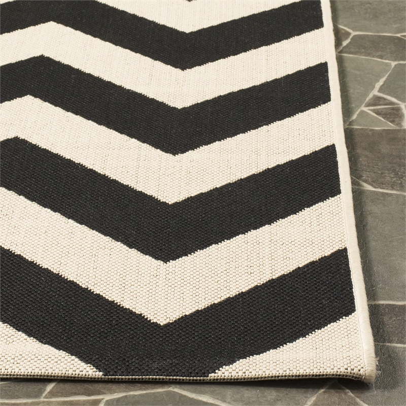 Pemberly Row Black Indoor Outdoor Runner Rug 2'3