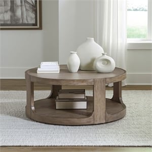 Pemberly Row Solid Wood Round Cocktail Table with Drawer in Brown