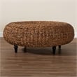 Pemberly Row Handwoven Seagrass Round Coffee Table with Turned Legs