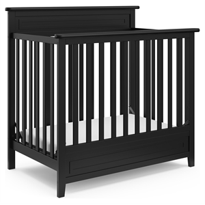 Pemberly Row 4-in-1 Engineered Wood Convertible Mini Crib in Black