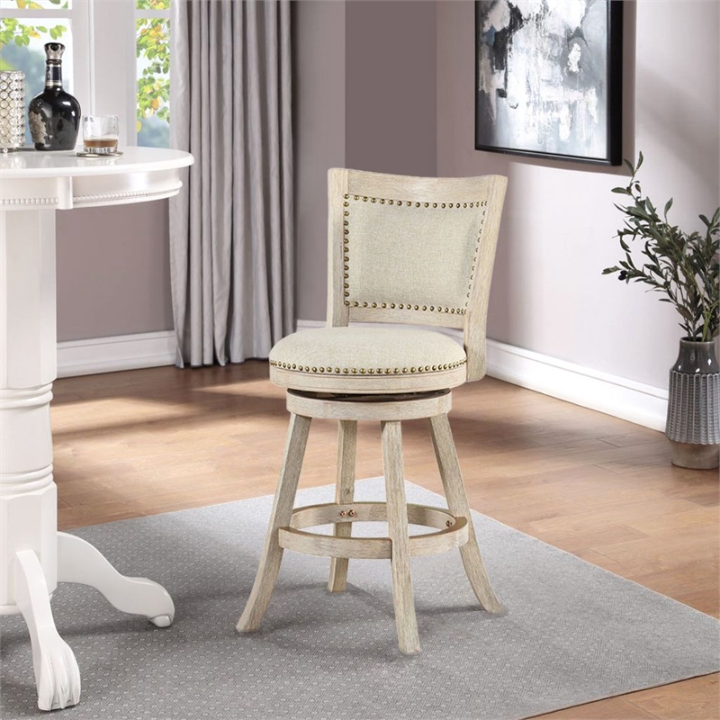 Pemberly Row Rubberwood Nailhead Swivel Counter Stool in Ivory