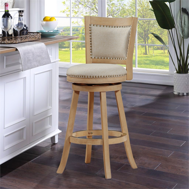 Pemberly Row Rubberwood Nailhead Swivel Bar Stool with Linen Seat in Cream