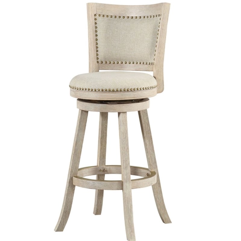Pemberly Row Rubberwood Nailhead Swivel Bar Stool with Footrest in Ivory