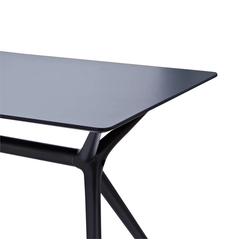 Pemberly Row 47 Inch Rectangular MDF Dining Table in Black with Tapered Legs
