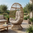 Pemberly Row Egg Shaped Outdoor Swivel Accent Chair with Cushion and Iron Frame