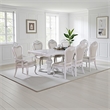 Pemberly Row 9 Piece Dining Set with White Wood Table and 8 Faux Leather Chairs