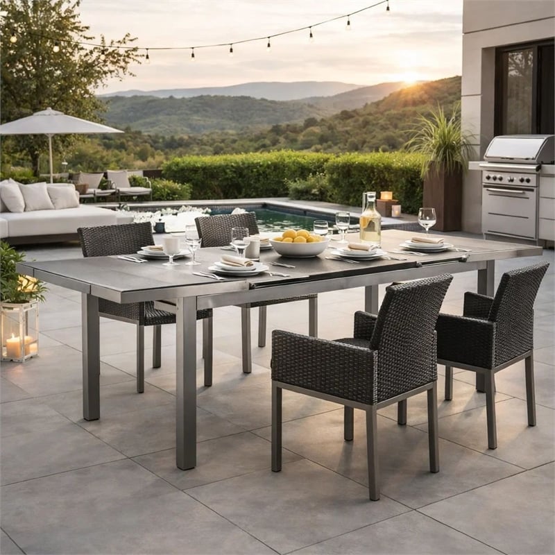 Pemberly Row 90 Inch Extendable Outdoor Dining Table with Polyresin Top in Gray