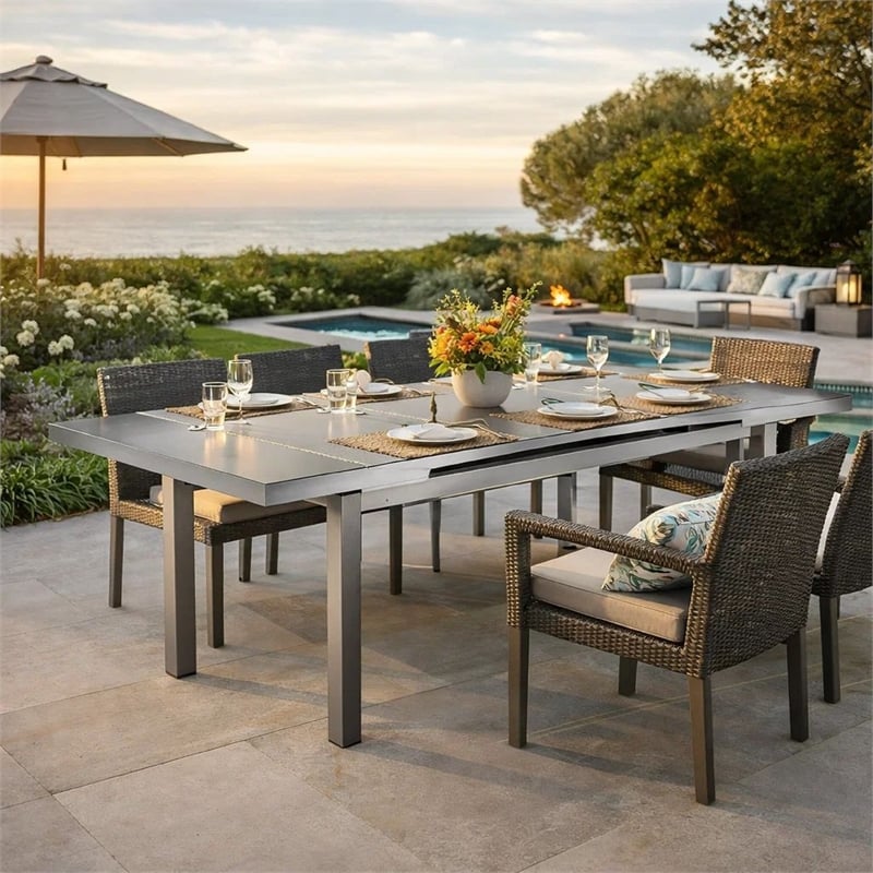 Pemberly Row 90 Inch Extendable Outdoor Dining Table with Polyresin Top in Gray