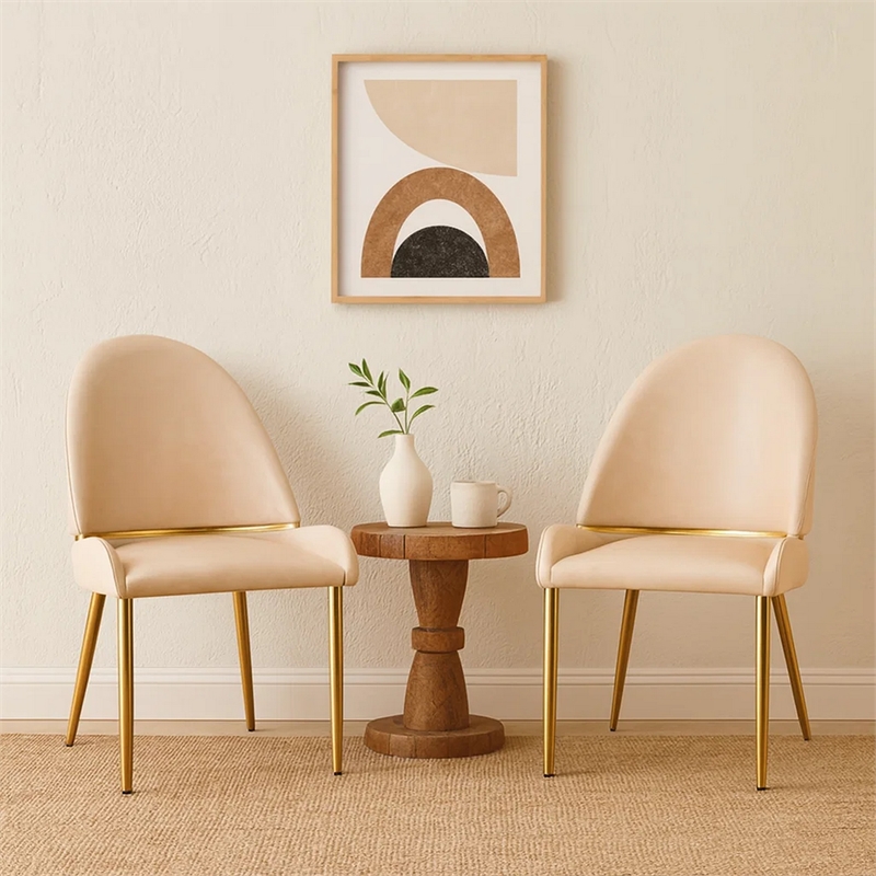 Pemberly Row Dining Chair Set of 2 Champagne Faux Leather Gold Metal Accents