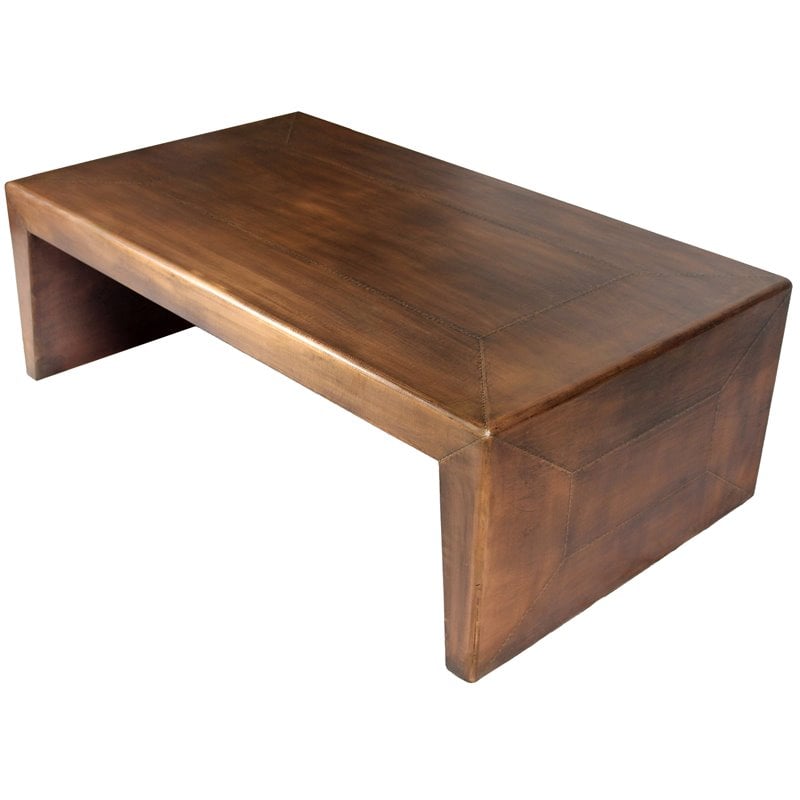 pemberly row aerodynamic metal-cladded solid wood cocktail table in copper