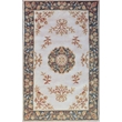 Pemberly Row 5x8 Hand-Tufted Wool Traditional Area Rug in Ivory